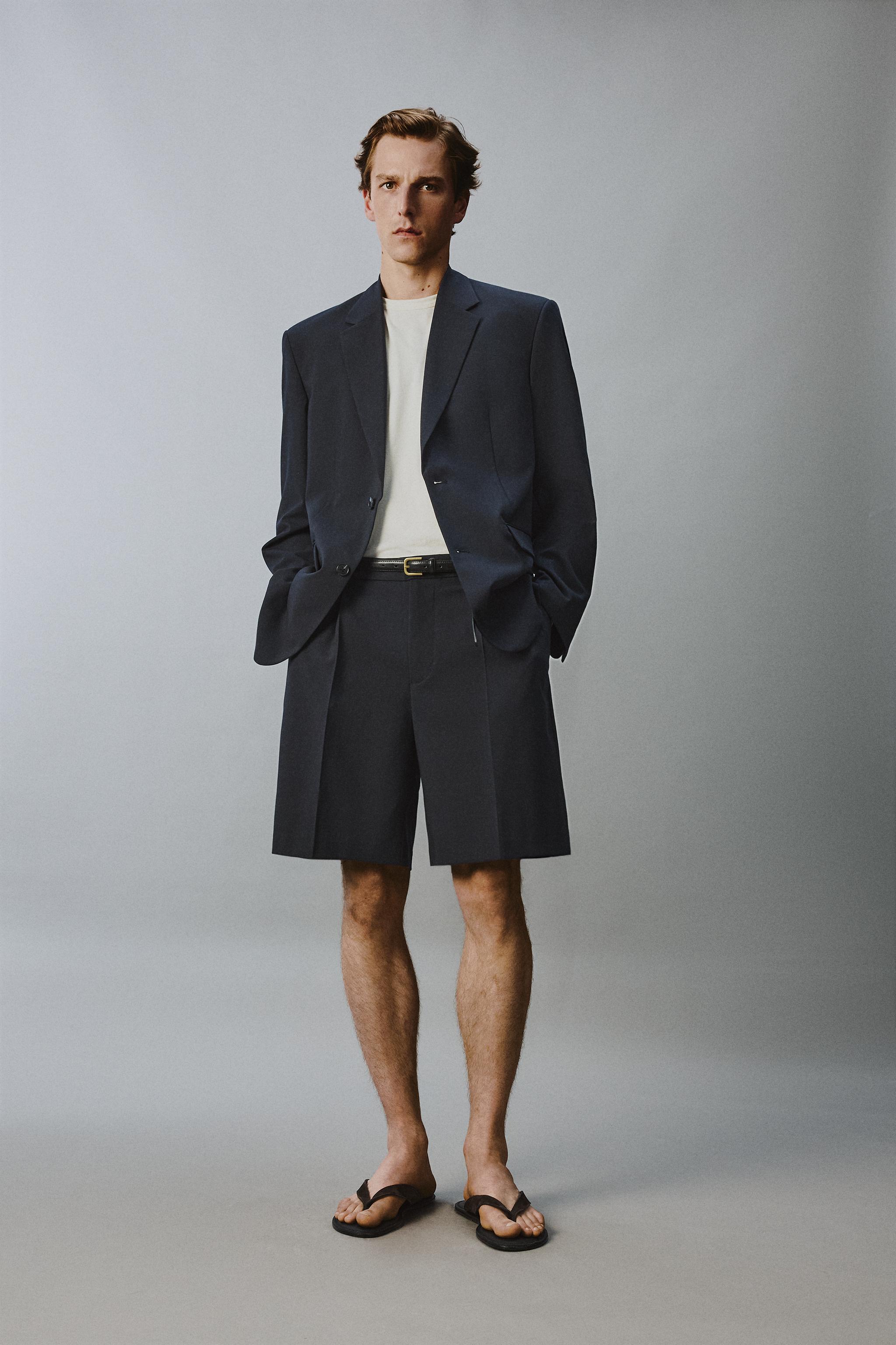 RELAXED FIT PLEATED SUIT SHORTS
